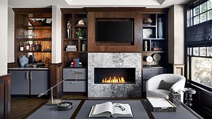 EcoSmart Fire Flex 50SS ethanol fireplace anchors Dual Concepts home office, single-sided built-in feature in black steel.