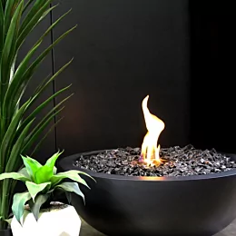EcoSmart Fire Mix 850 Fire Pit in a Wellington commercial showroom offers a bold graphite concrete centrepiece with clean-burning ethanol for modern interiors.