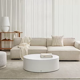 Blinde Design Circ 40 concrete coffee table anchors a private living room, offering a sleek round centrepiece for contemporary interior style.