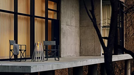 EcoSmart Fire Stix Fire Pit creates a striking outdoor feature for a private residence deck in Japan with clean-burning ethanol flames.